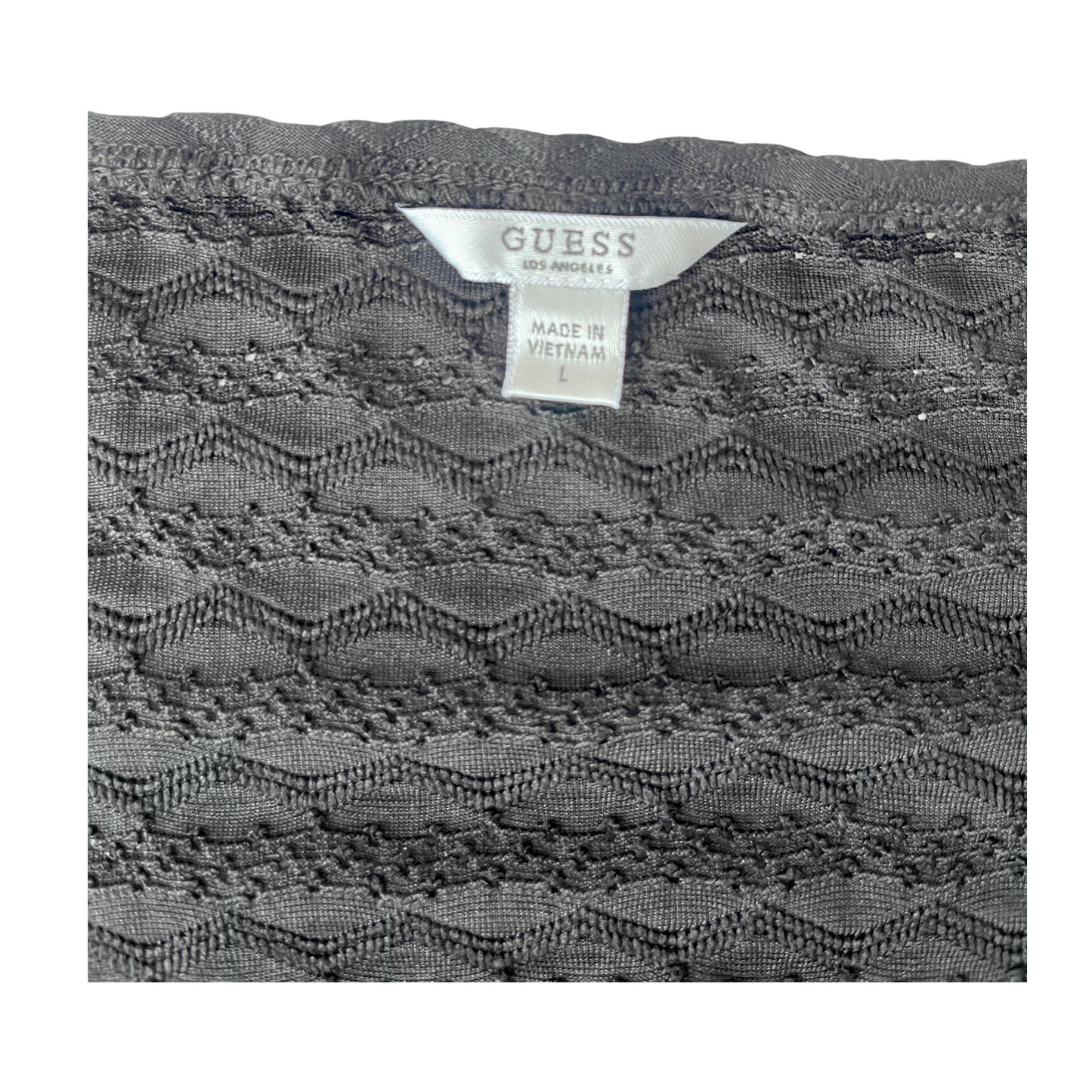 Top Guess negro de hombros descubiertos con textura geométrica – Talla L